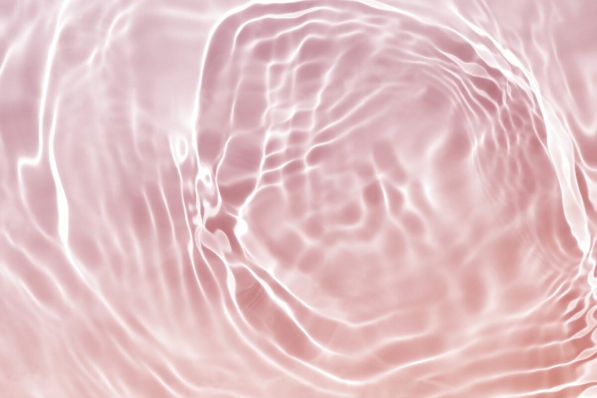upclose serum base on pink background